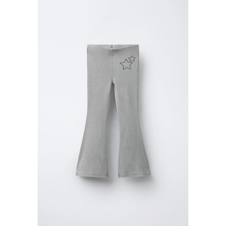 ЛЕГИНСЫ FLARE С ЭФФЕКТОМ ПОСТИРАННОСТИ И ЗВЕЗДАМИ