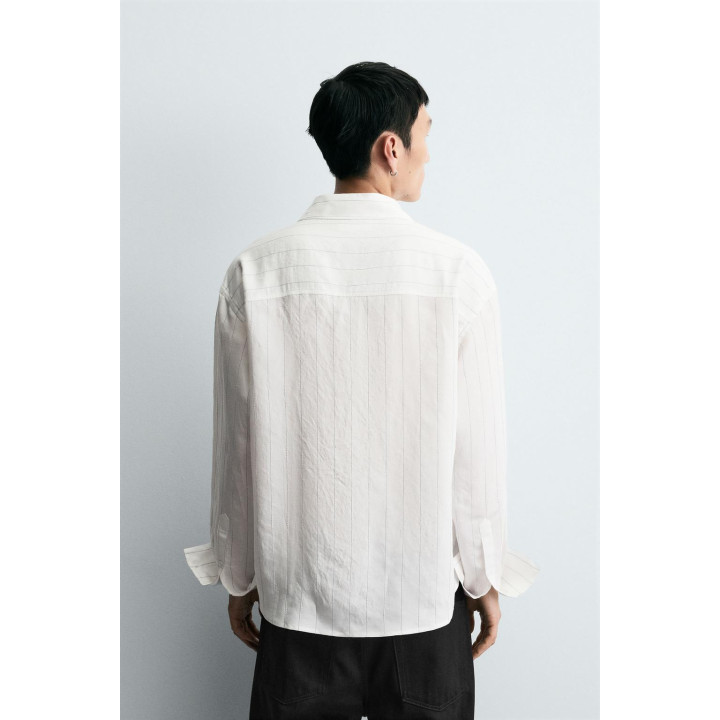 РУБАШКА СТРУЯЩЕГОСЯ ПОКРОЯ С НЕРОВНОЙ ПОЛОСКОЙ