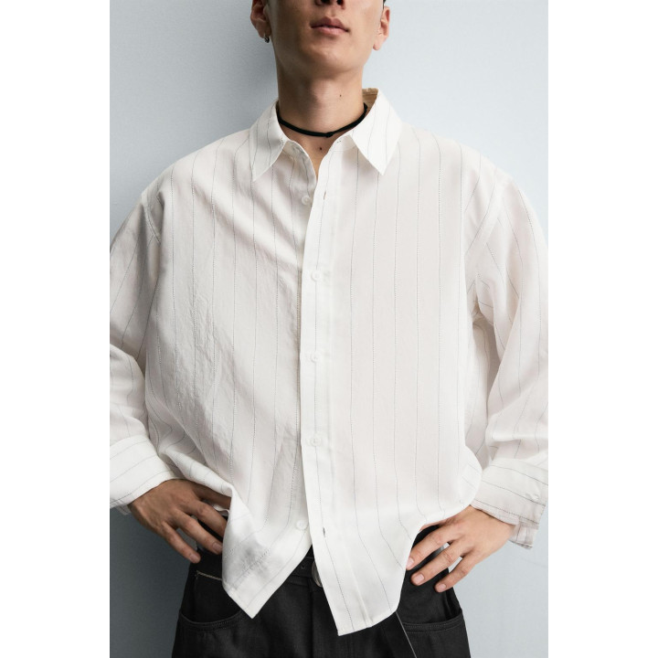 РУБАШКА СТРУЯЩЕГОСЯ ПОКРОЯ С НЕРОВНОЙ ПОЛОСКОЙ