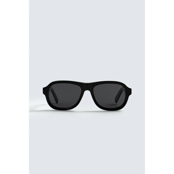 Солнечные очки овальной формы