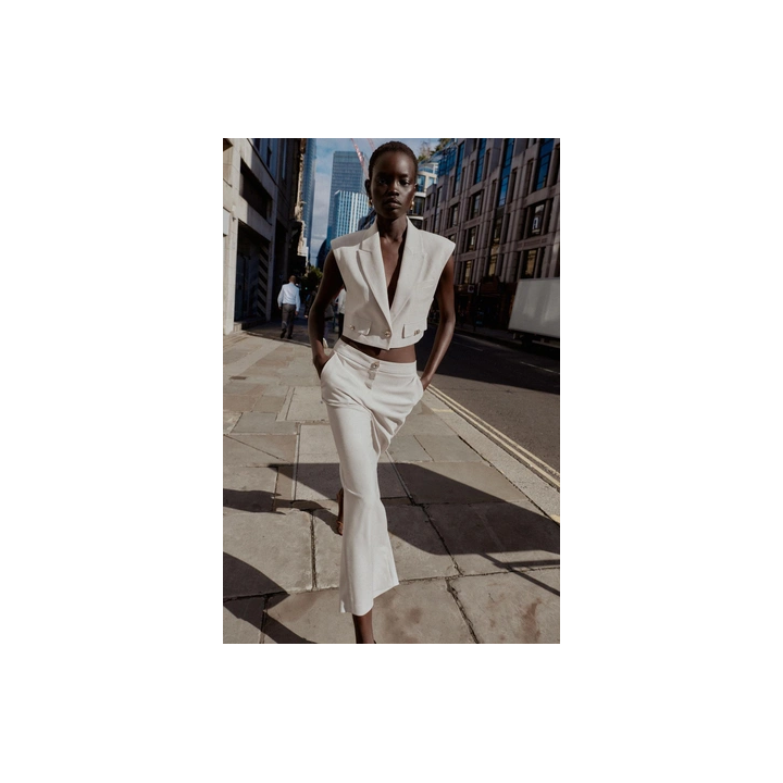 УКОРОЧЕННЫЙ ЖИЛЕТ С КЛАПАНАМИ