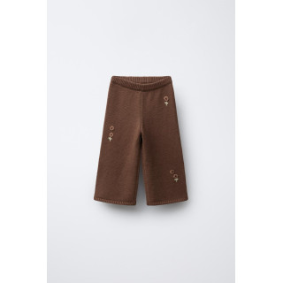 ТРИКОТАЖНЫЕ БРЮКИ С ВЫШИВКОЙ В ВИДЕ ЦВЕТОВ