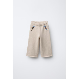 ТРИКОТАЖНЫЕ БРЮКИ С ВЫШИВКОЙ В ВИДЕ ЦВЕТОВ