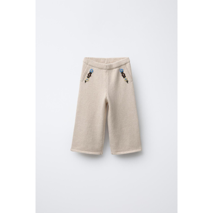 ТРИКОТАЖНЫЕ БРЮКИ С ВЫШИВКОЙ В ВИДЕ ЦВЕТОВ