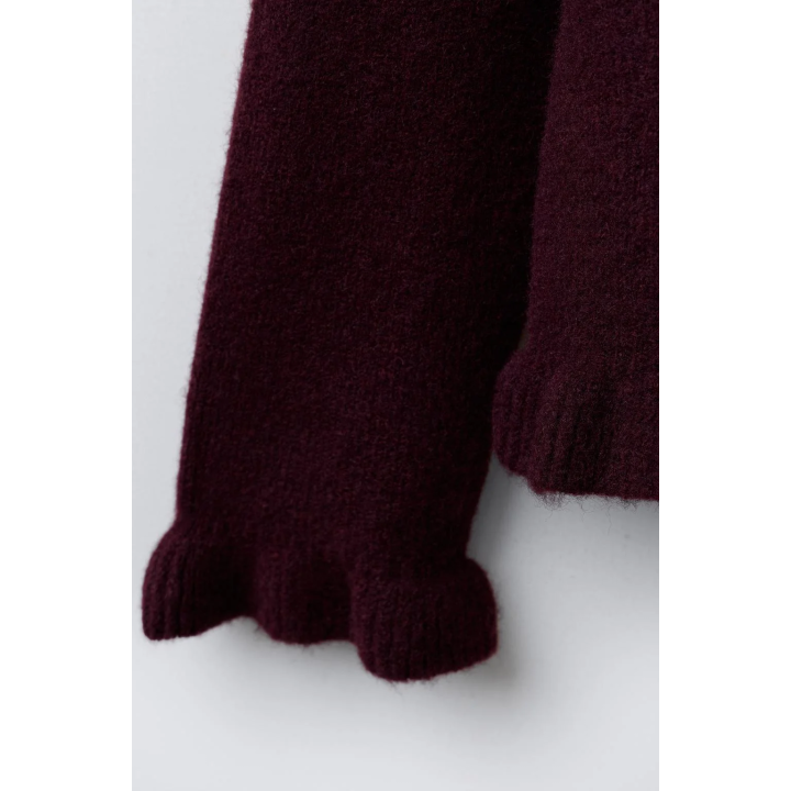 ВЯЗАНЫЙ ДЖЕРСИ С ВОЛАНАМИ