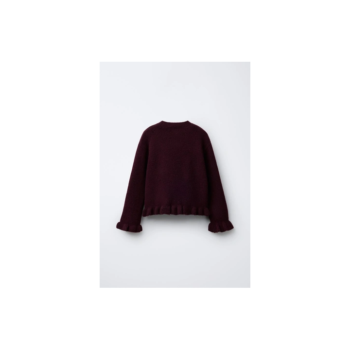 ВЯЗАНЫЙ ДЖЕРСИ С ВОЛАНАМИ