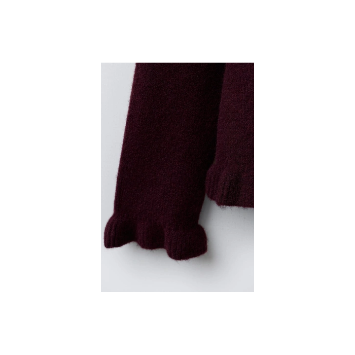 ВЯЗАНЫЙ ДЖЕРСИ С ВОЛАНАМИ