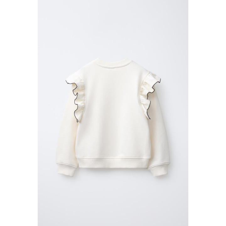 ТОЛСТОВКА С ВОЛАНАМИ И ОТСТРОЧКОЙ