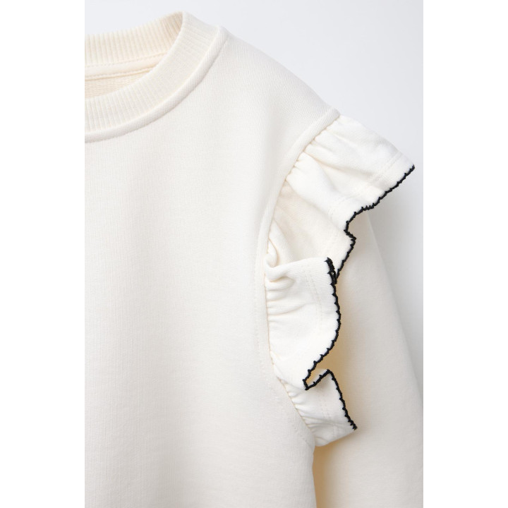 ТОЛСТОВКА С ВОЛАНАМИ И ОТСТРОЧКОЙ