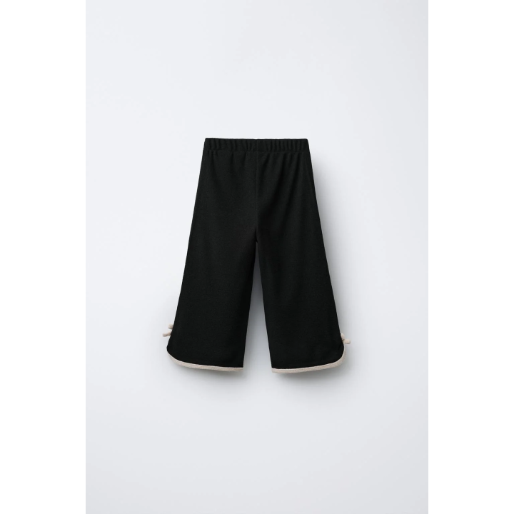 БРЮКИ-КЮЛОТЫ ИЗ МЯГКОЙ ТКАНИ С КОНТРАСТНЫМ БАНТОМ