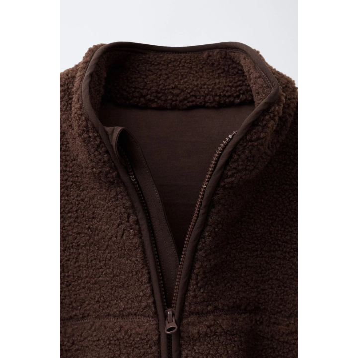 КУРТКА ИЗ ИСКУССТВЕННОЙ ОВЧИНЫ С ОТОРОЧКОЙ