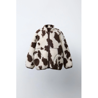 КУРТКА ИЗ ИСКУССТВЕННОЙ ОВЧИНЫ С КОРОВЬИМ ПРИНТОМ