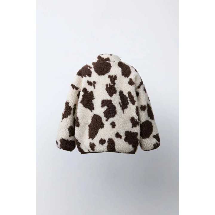 КУРТКА ИЗ ИСКУССТВЕННОЙ ОВЧИНЫ С КОРОВЬИМ ПРИНТОМ