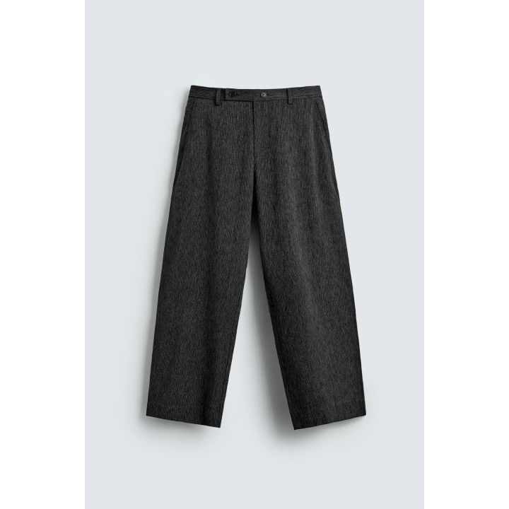 Брюки морковинного кроя с текстурой