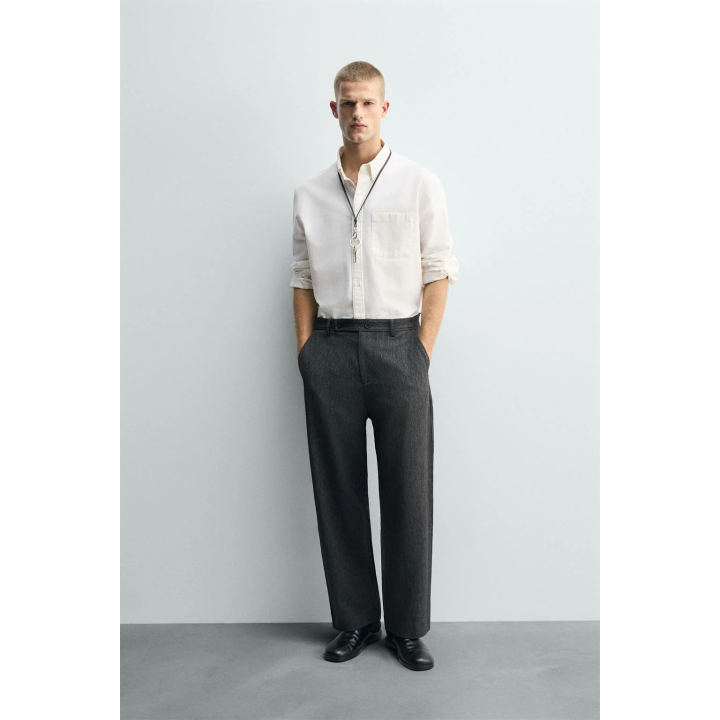 Брюки морковинного кроя с текстурой