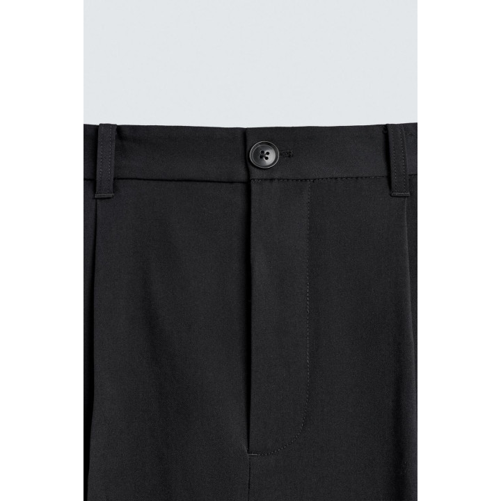 БРЮКИ СО СКЛАДКАМИ ИЗ РЕЛЬЕФНОЙ ТКАНИ