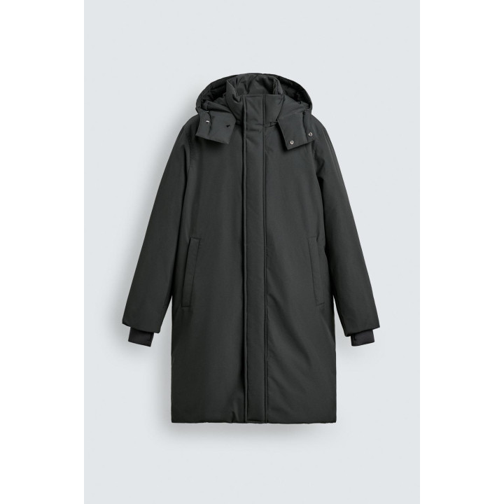 Длинный стеганый пуховик