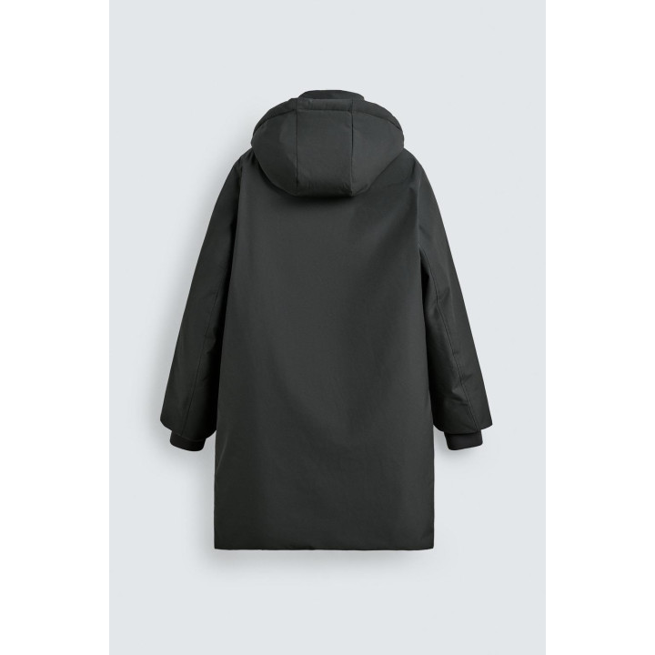 Длинный стеганый пуховик