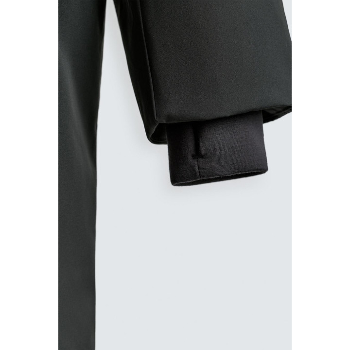 Длинный стеганый пуховик