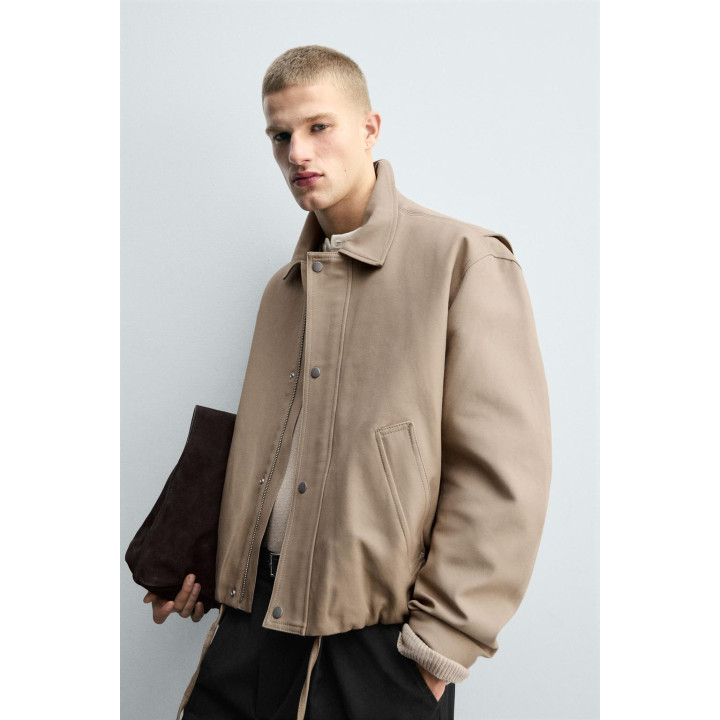 УКОРОЧЕННАЯ СТЕГАНАЯ КУРТКА