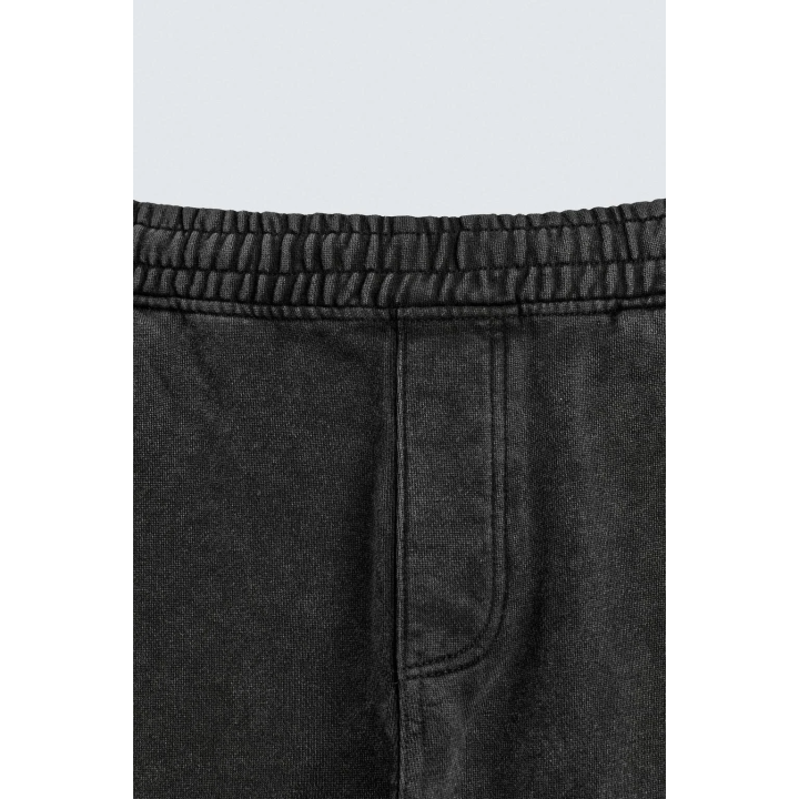 Джоггеры в свободном крое с эффектом потертости