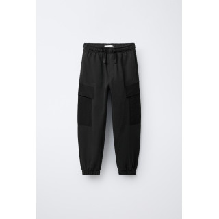 ДЖОГГЕРЫ ИЗ МЯГКОЙ ТКАНИ С КОМБИНИРОВАННЫМИ ЭЛЕМЕНТАМИ