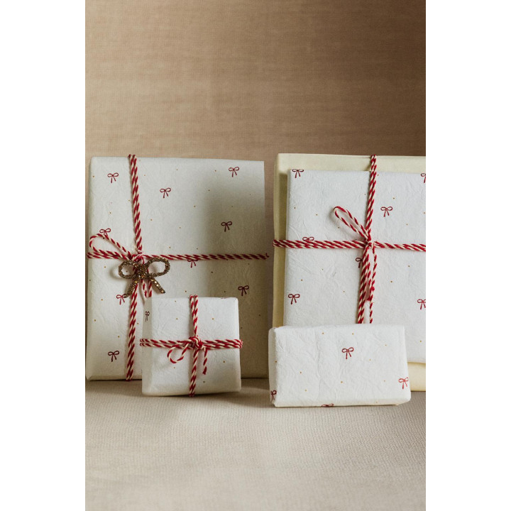 Подарочная упаковка для рождества с бантами