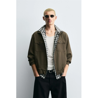 КУРТКА ИЗ СТРУЯЩЕЙСЯ ТКАНИ СВОБОДНОГО КРОЯ