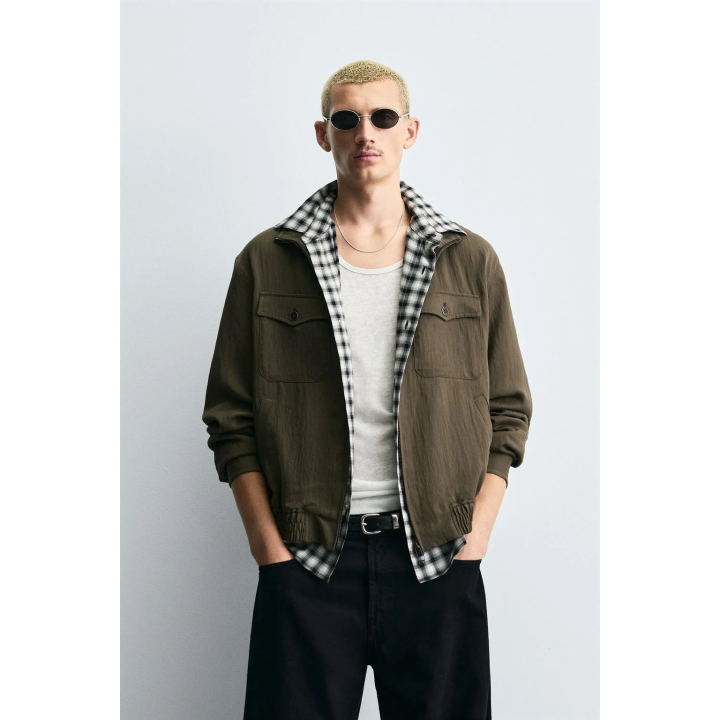 КУРТКА ИЗ СТРУЯЩЕЙСЯ ТКАНИ СВОБОДНОГО КРОЯ