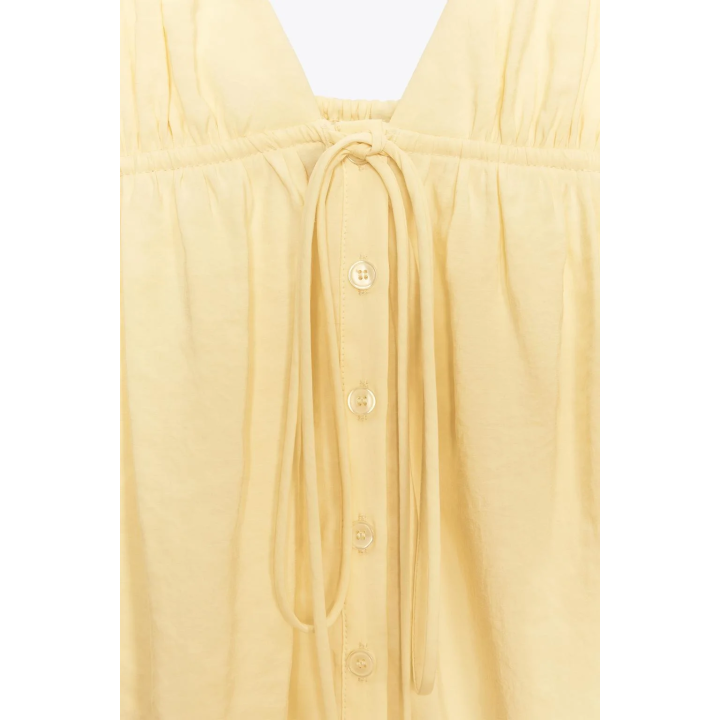 СТРУЯЩИЙСЯ ТОП НА БРЕТЕЛЯХ