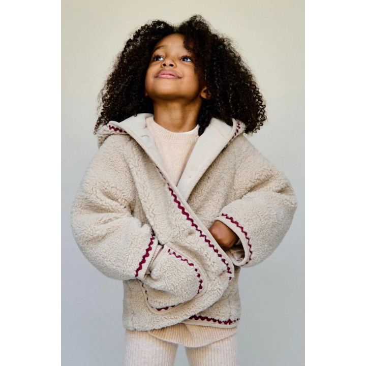 FAUX SHEARLING JACKET WITH WAVY TRIM AND FLEECE LINING