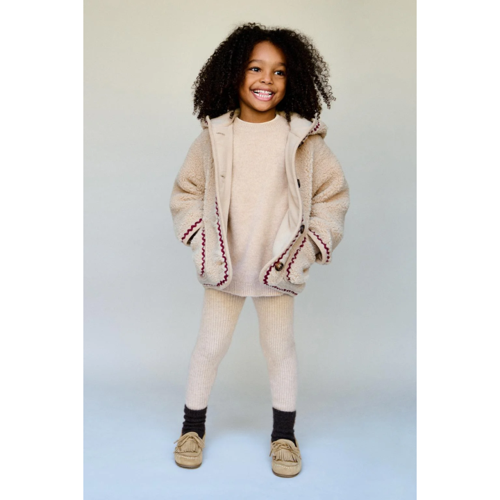 FAUX SHEARLING JACKET WITH WAVY TRIM AND FLEECE LINING