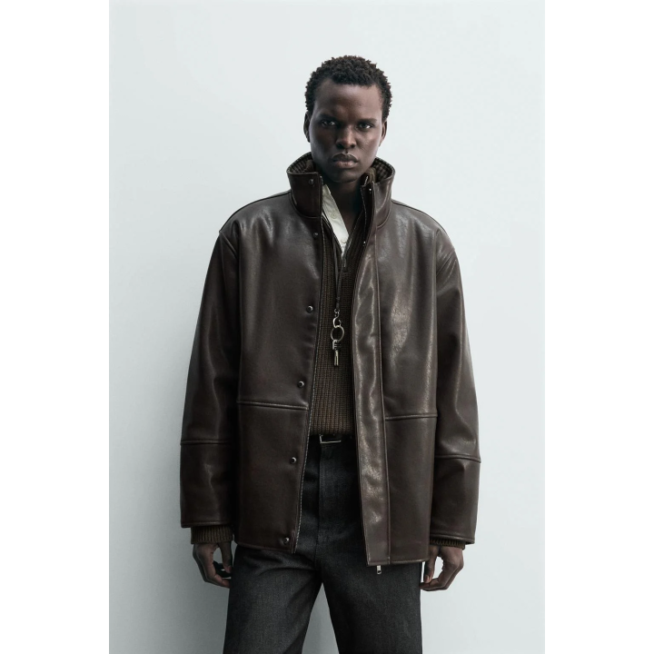 Куртка с контрастной отделкой под кожу