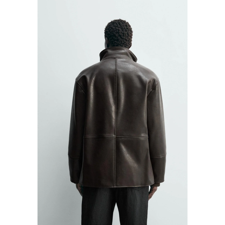 Куртка с контрастной отделкой под кожу