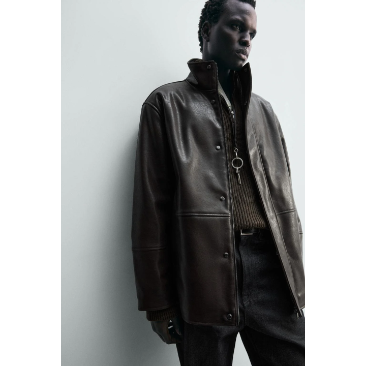 Куртка с контрастной отделкой под кожу