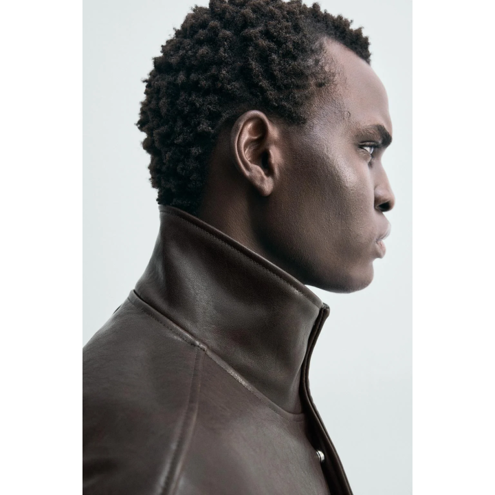 Куртка с контрастной отделкой под кожу