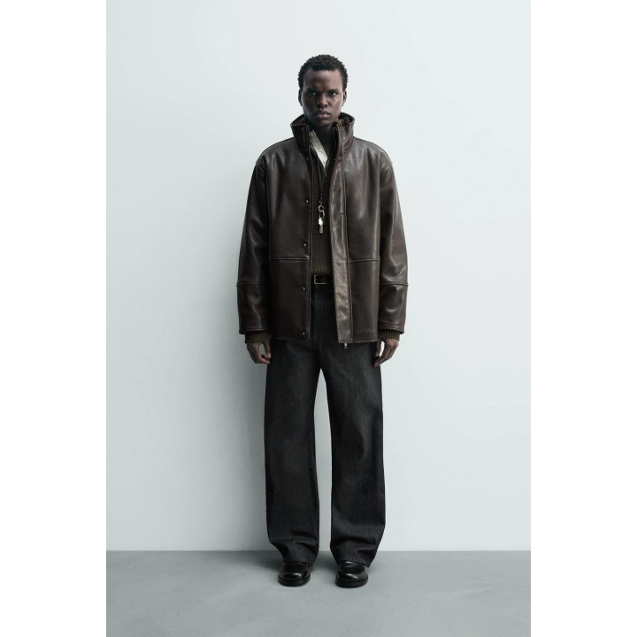 Куртка с контрастной отделкой под кожу