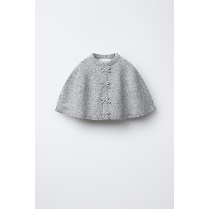 ПОНЧО-НАКИДКА С БАНТИКАМИ