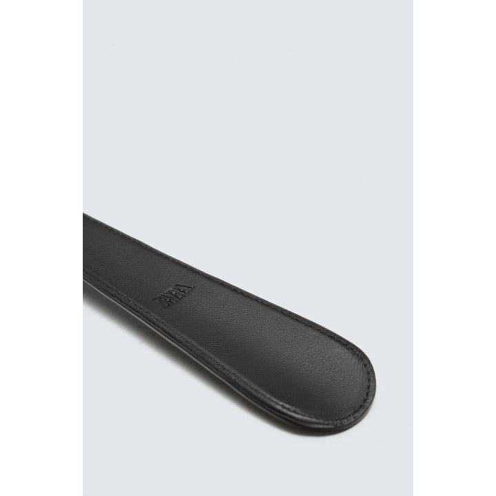 Скребок для обуви из кожи