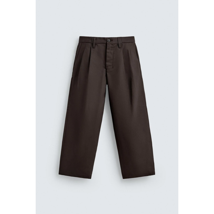 Широкие брюки-чино с защипами