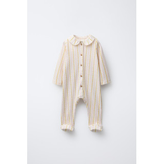 КОМБИНЕЗОН С ЦВЕТОЧНЫМ ПРИНТОМ И СКЛАДНЫМИ НОЖКАМИ