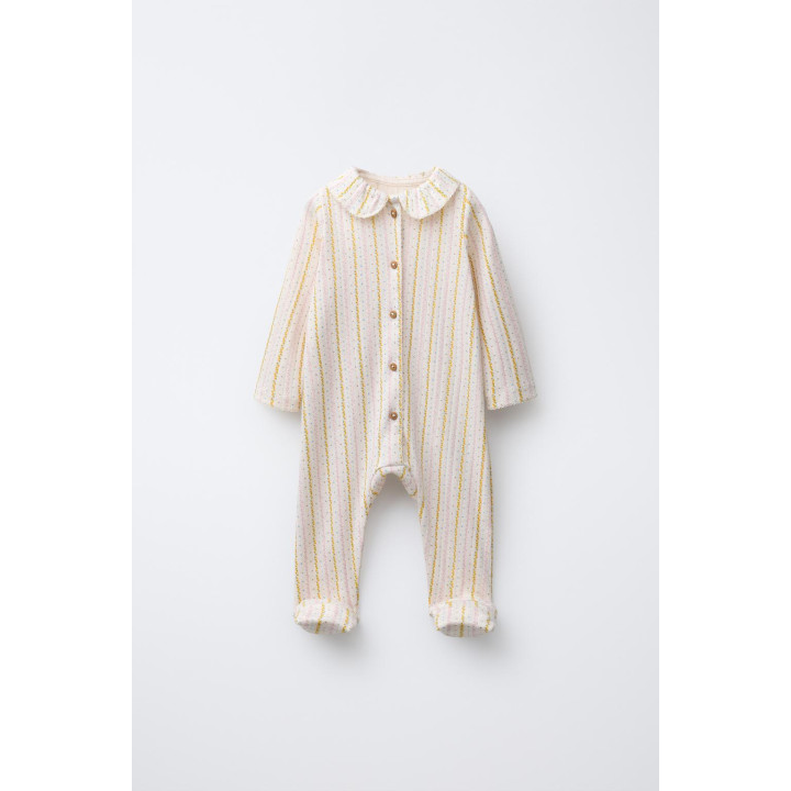 КОМБИНЕЗОН С ЦВЕТОЧНЫМ ПРИНТОМ И СКЛАДНЫМИ НОЖКАМИ