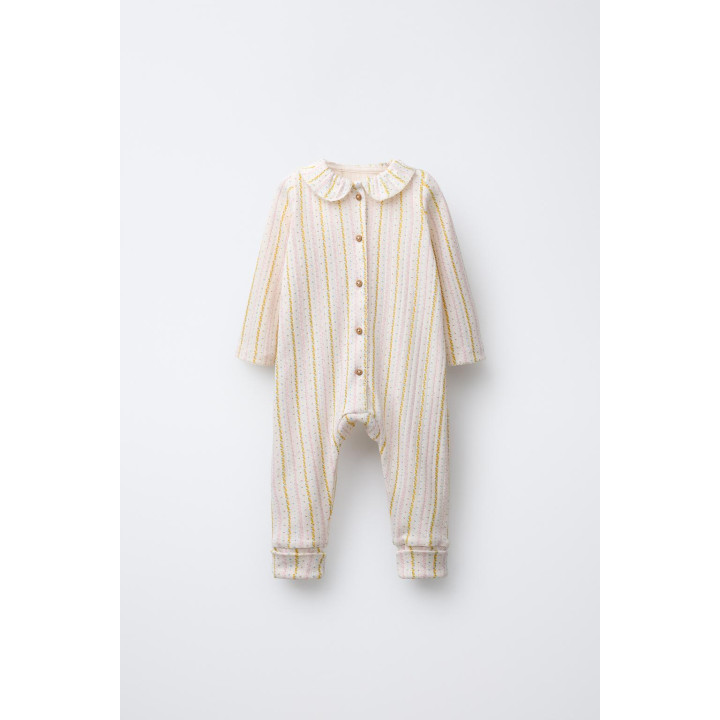 КОМБИНЕЗОН С ЦВЕТОЧНЫМ ПРИНТОМ И СКЛАДНЫМИ НОЖКАМИ