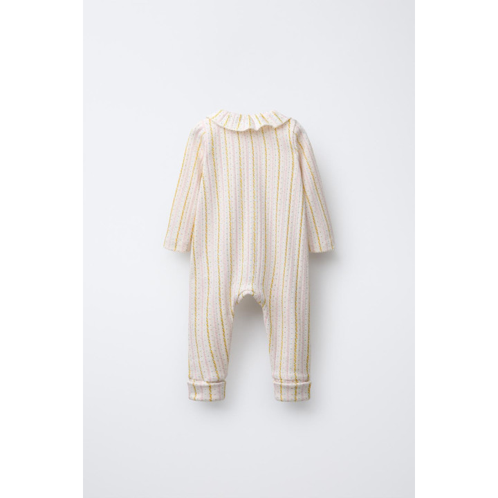 КОМБИНЕЗОН С ЦВЕТОЧНЫМ ПРИНТОМ И СКЛАДНЫМИ НОЖКАМИ