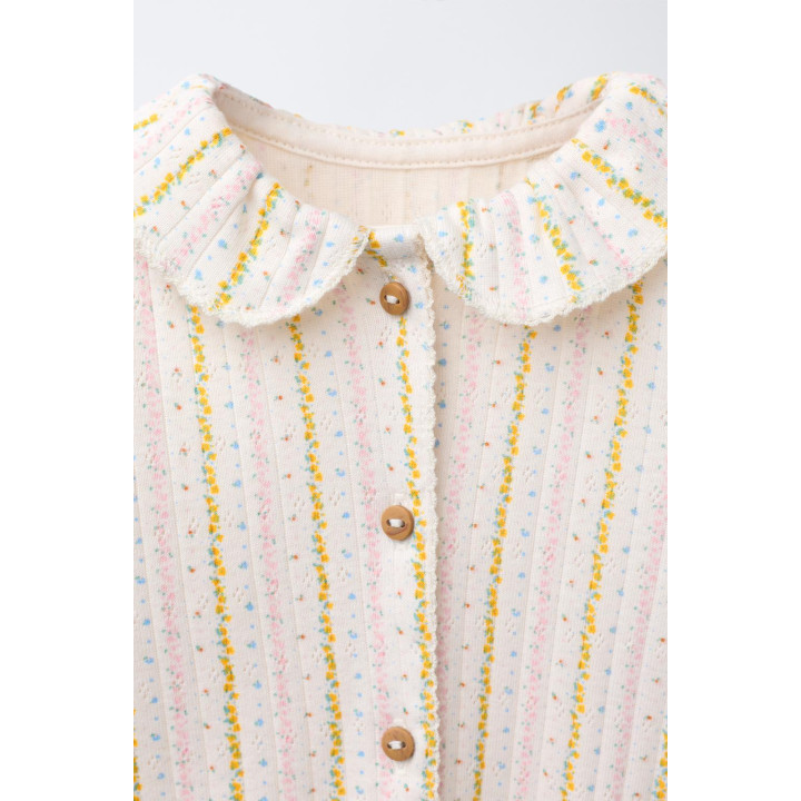 КОМБИНЕЗОН С ЦВЕТОЧНЫМ ПРИНТОМ И СКЛАДНЫМИ НОЖКАМИ