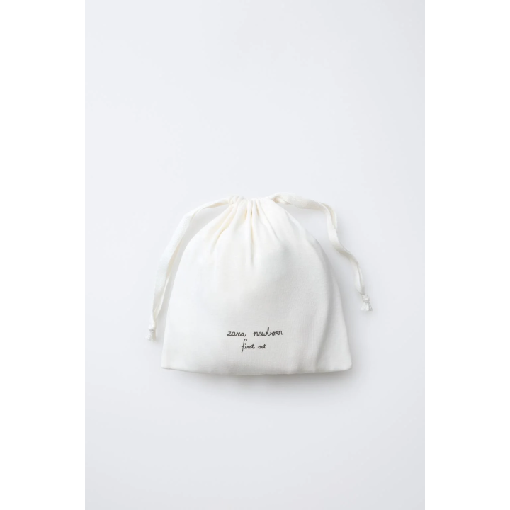 Первый комплект одежды и сумка