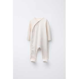 КОМБИНЕЗОН С РЕГУЛИРУЕМЫМИ ШТАНИНАМИ И V-ОБРАЗНЫМ ВЫРЕЗОМ