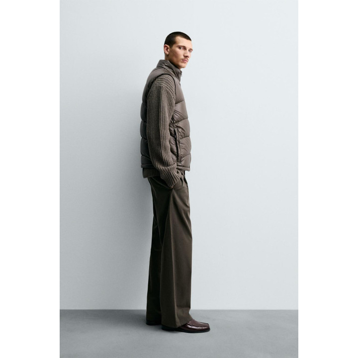 НЕПРОМОКАЕМЫЙ ПУХОВЫЙ ЖИЛЕТ ИЗ 100% ПЕРЬЕВ