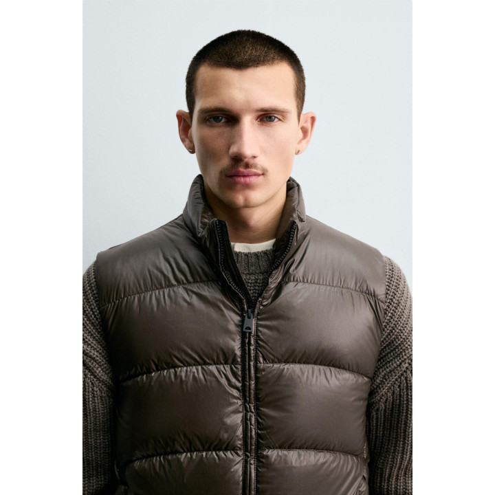 НЕПРОМОКАЕМЫЙ ПУХОВЫЙ ЖИЛЕТ ИЗ 100% ПЕРЬЕВ