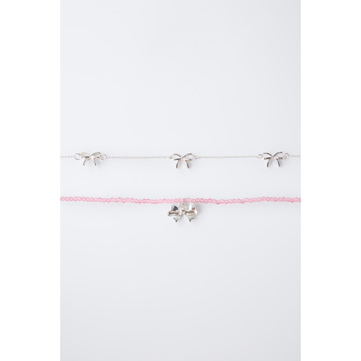 НАБОР ИЗ ДВУХ ОЖЕРЕЛИЙ С БАНТИКАМИ